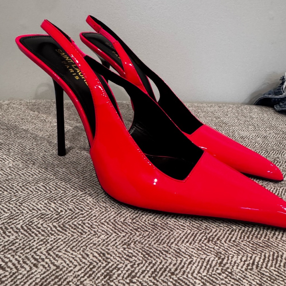 Hot pink patent YSL slingback pump. Like new. Worn indoors once.